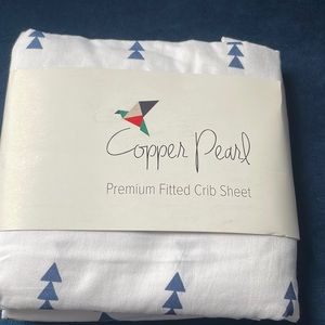 NWT: Copper Pearl Premium Crib Sheet: White with blue triangles
